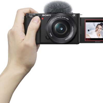 Sony ZV-E10 Mirrorless Camera with 16-50mm Lens, 128GB Extreem Speed Memory,.43 Wide Angle & 2X Lenses, Case. Tripod, Filters, Hood, Grip,Spare Battery & Charger, Editing Software Kit -Deluxe Bundle