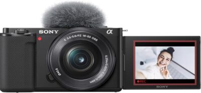 Sony ZV-E10 Mirrorless Camera with 16-50mm Lens, 128GB Extreem Speed Memory,.43 Wide Angle & 2X Lenses, Case. Tripod, Filters, Hood, Grip,Spare Battery & Charger, Editing Software Kit -Deluxe Bundle